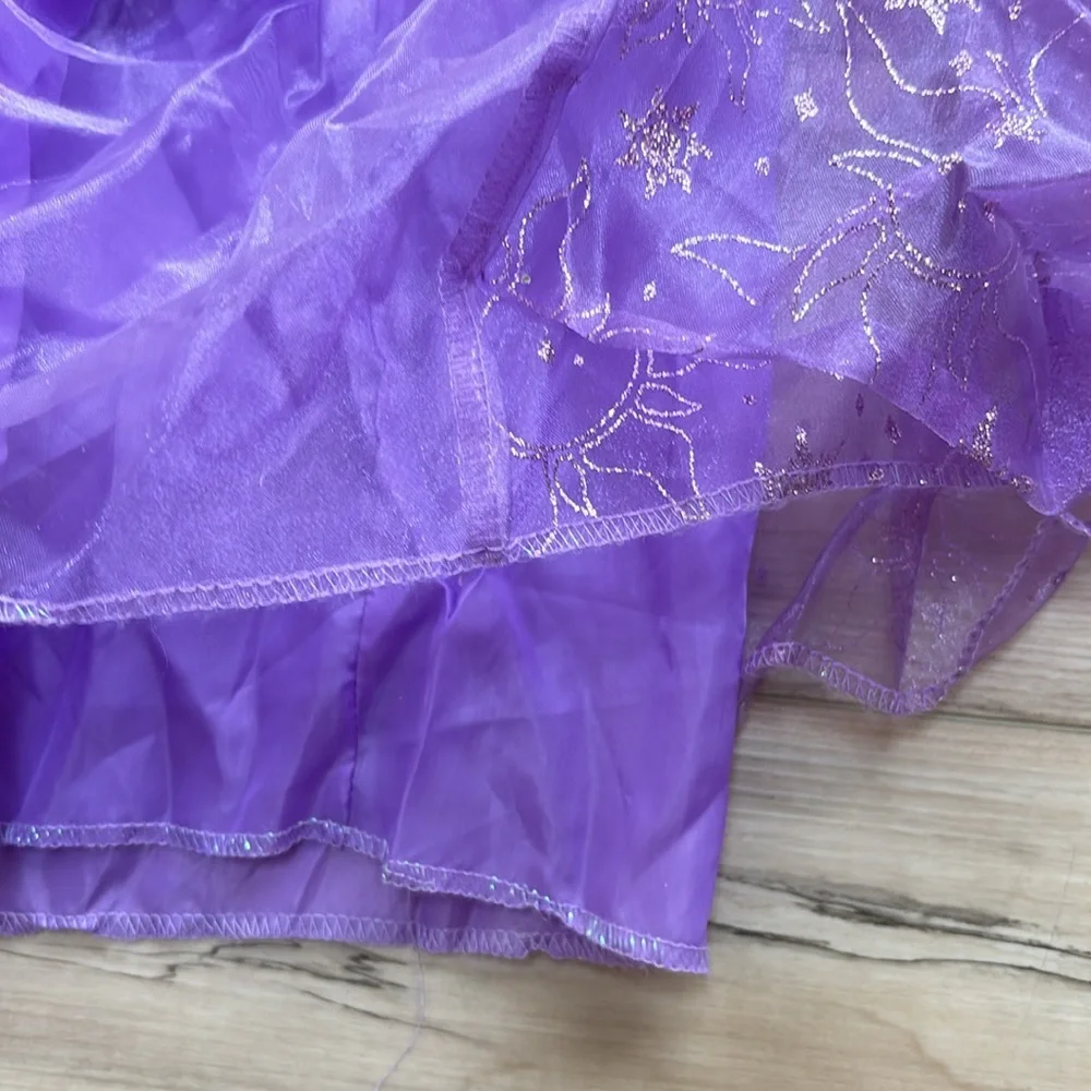 NWT Disney Princess Rapunzel Dress Up Dress. Girls Size M 7/8. Runs long. Pretty